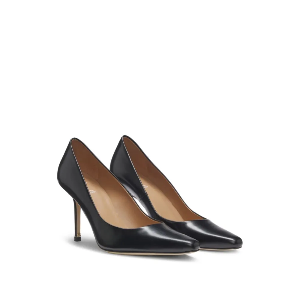 Stretchable Pointed-toe pumps in polished leather